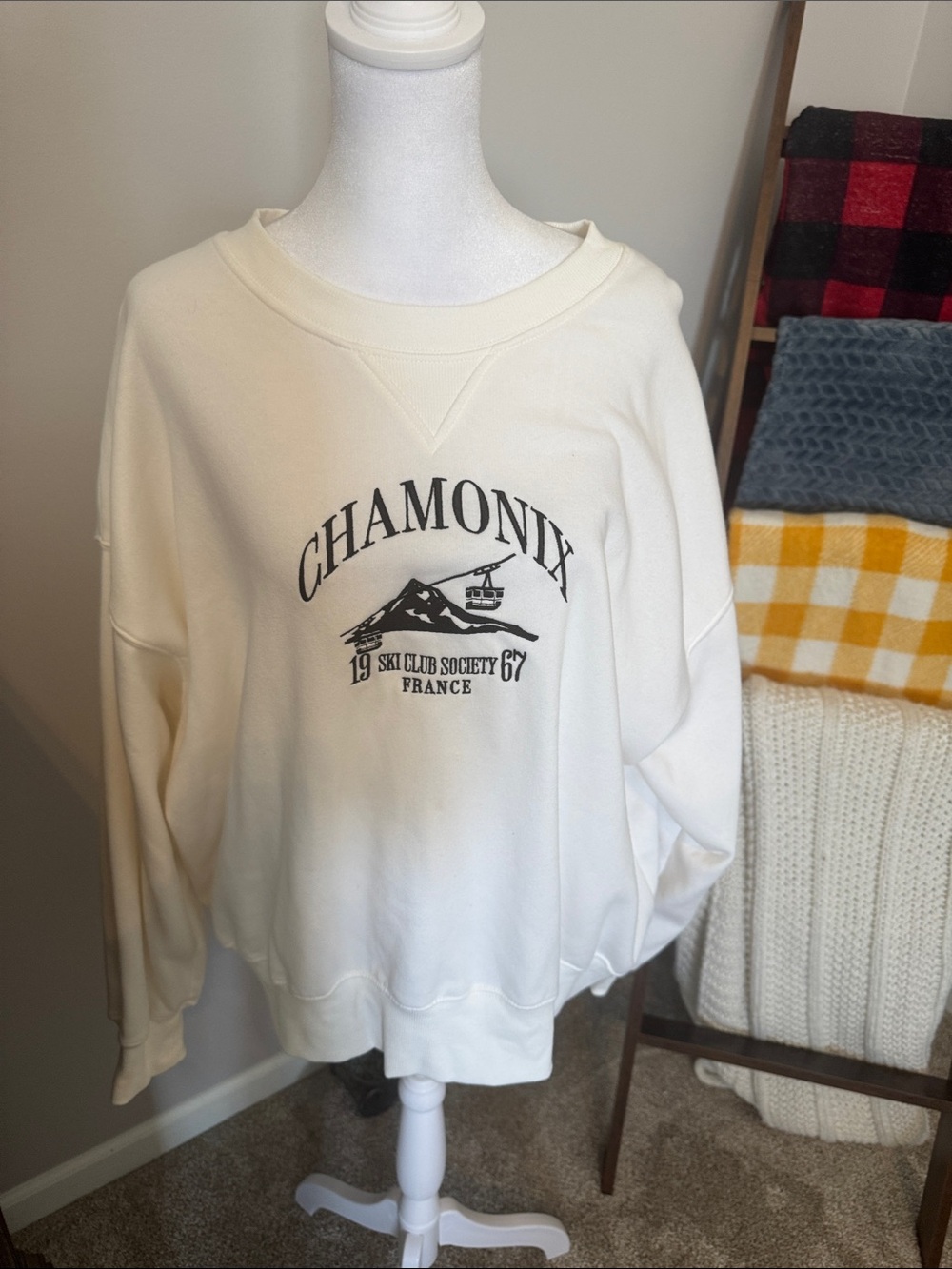 Divided Cream Crewneck Sweatshirt with Black Chamonix Graphic